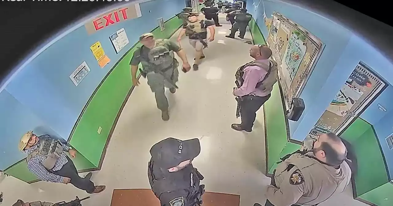 Newly released video shows police waiting in Uvalde school as massacre unfolded