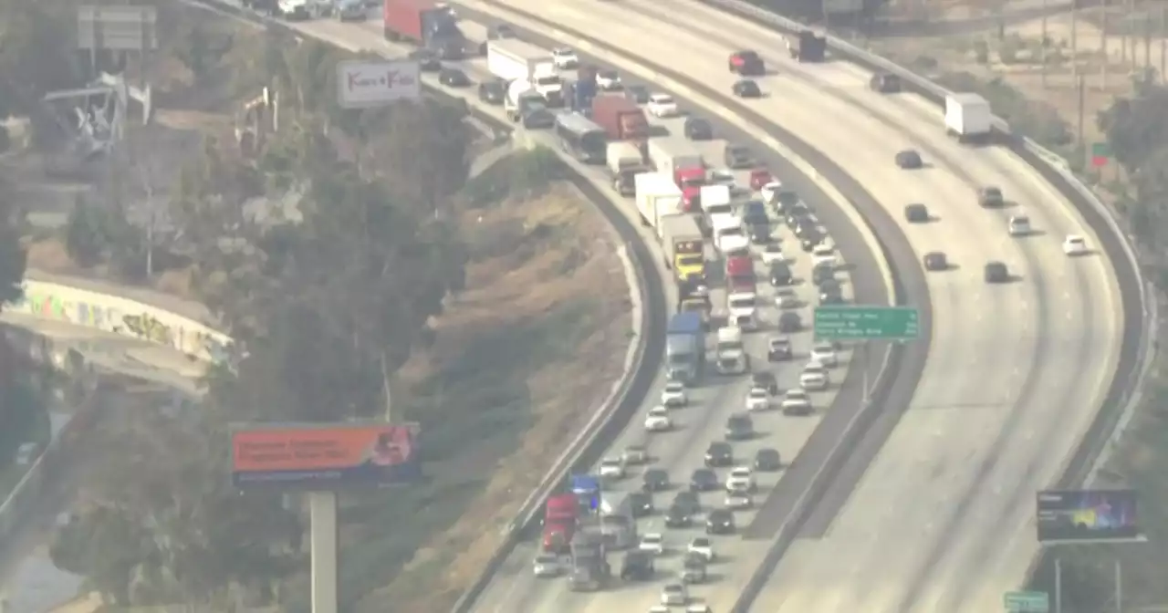 Convoy of big rigs slow traffic on LA freeways in protest of gig worker law