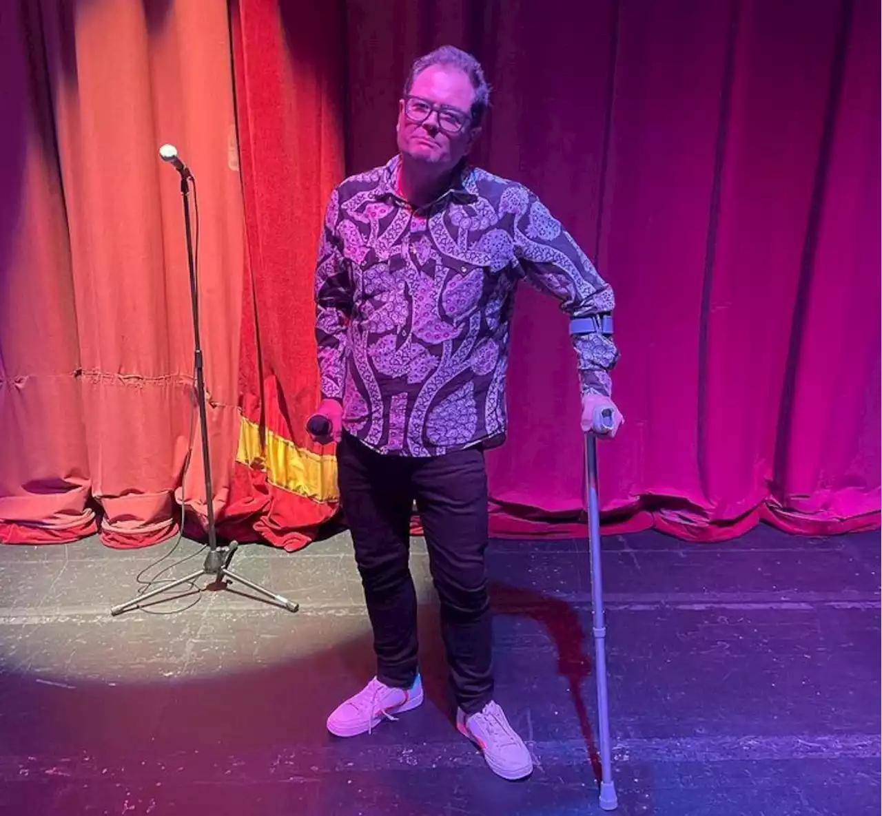 Alan Carr Updates Fans On Condition After Falling To Floor In Pain During Recent Comedy Show