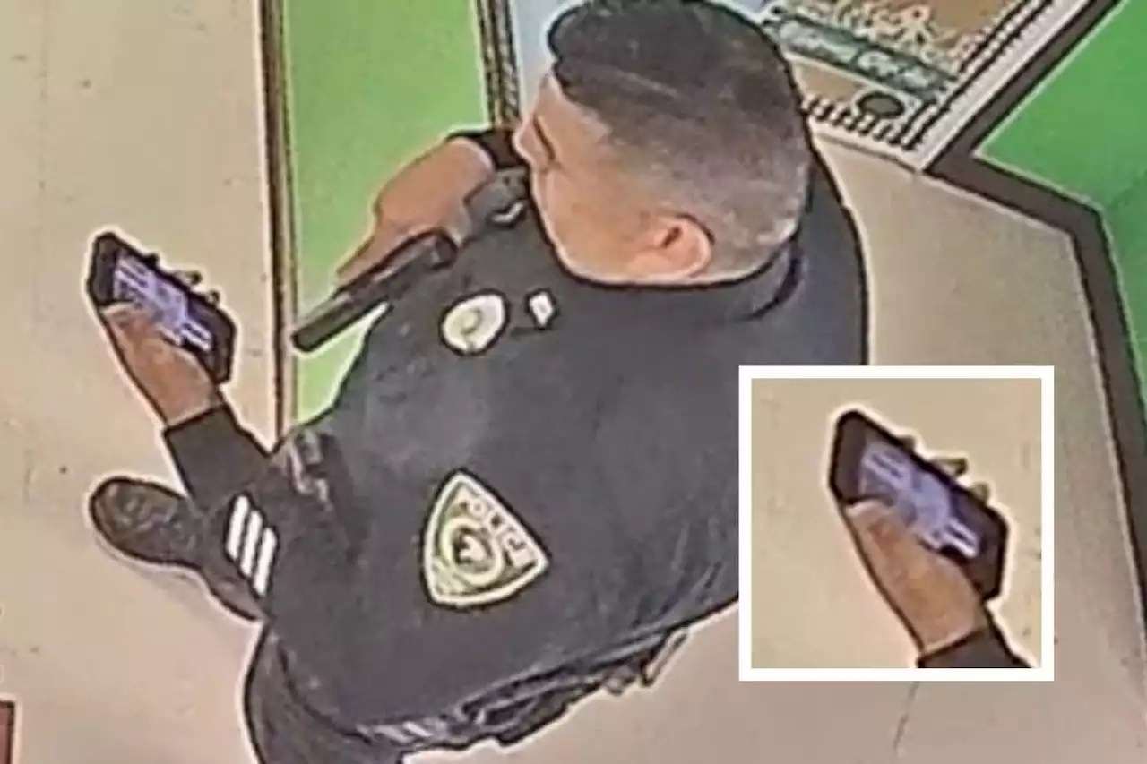 Uvalde officer checks phone with Punisher lock screen during shooting—Video