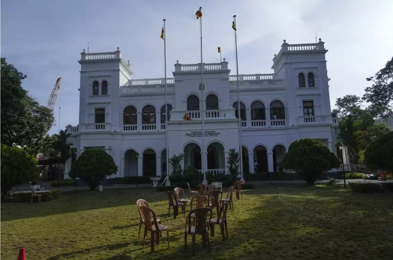 Protesters in Sri Lanka fall back as president resigns