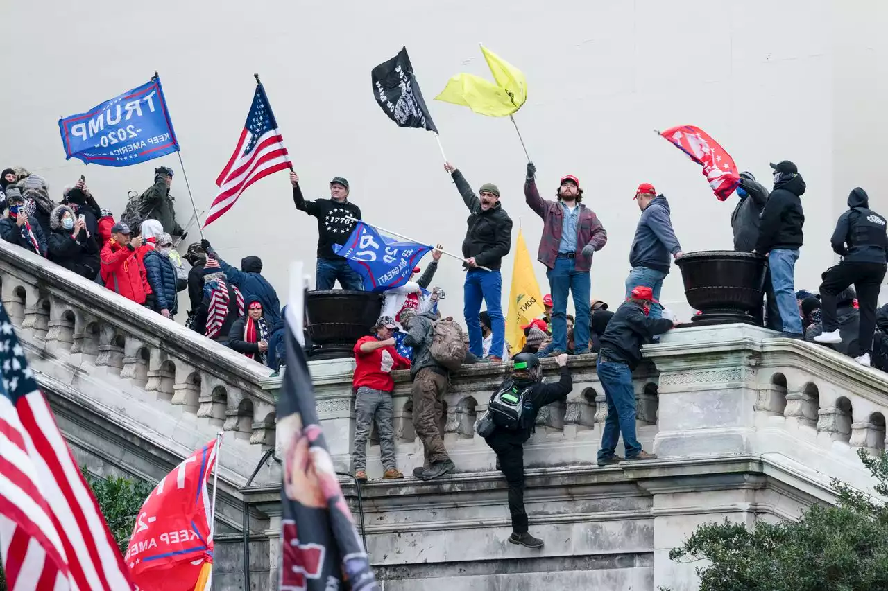 Capitol rioter with Confederate flag given 5 months in prison