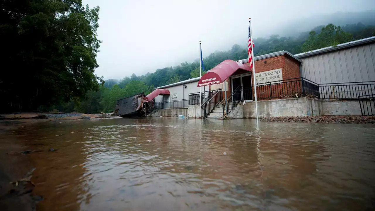 Virginia flooding leaves more than a dozen people unaccounted for as over 100 homes damaged