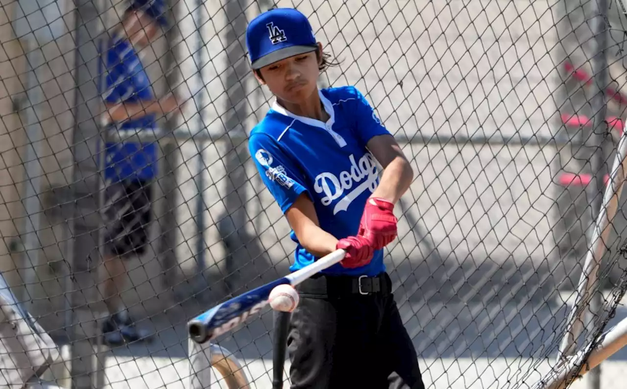 MLB All-Star week: Kids pitch, run and hit homers during Compton clinic