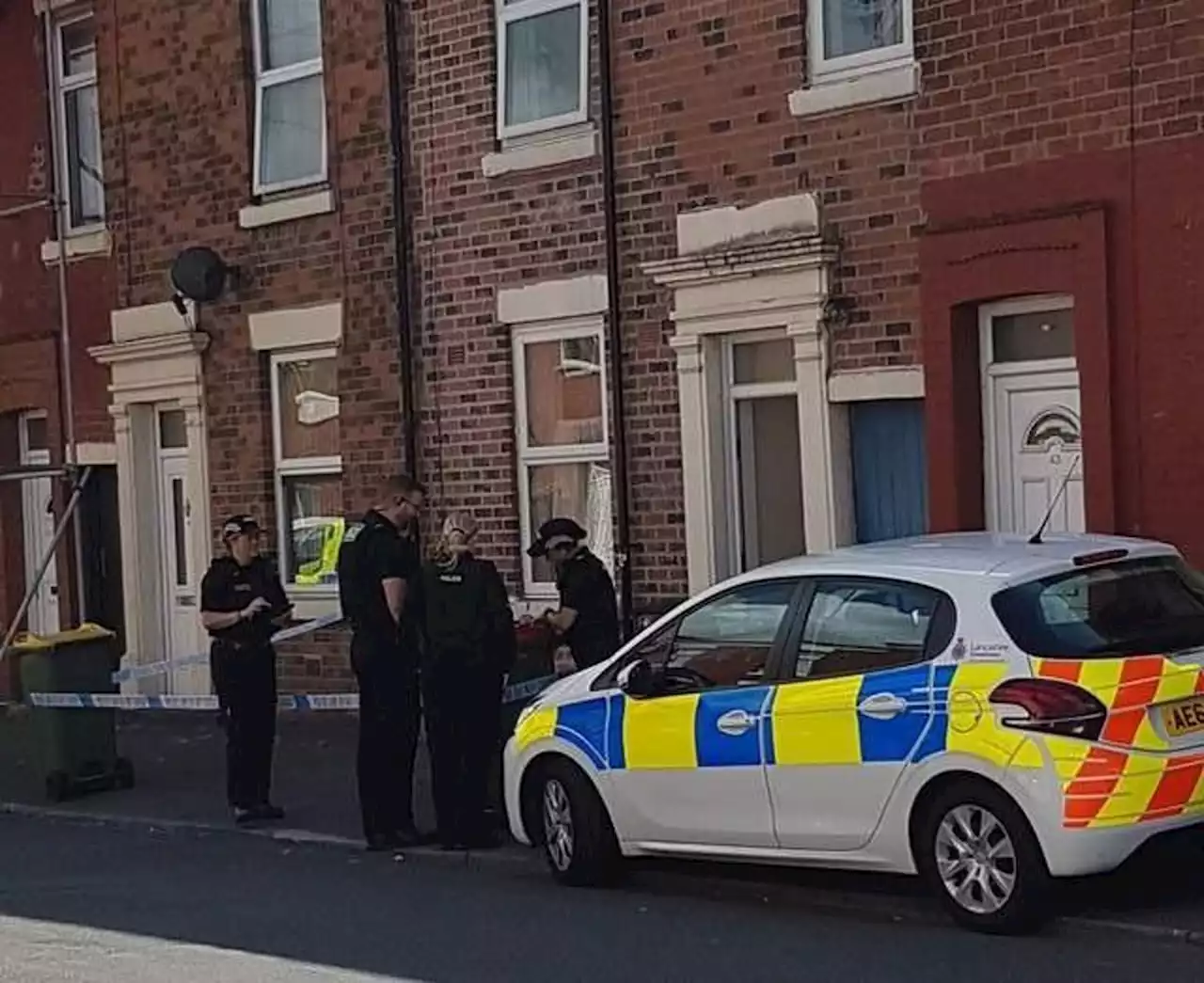 'The boy was lying on the floor screaming': Neighbours on street where boy fell from window tell of their shock