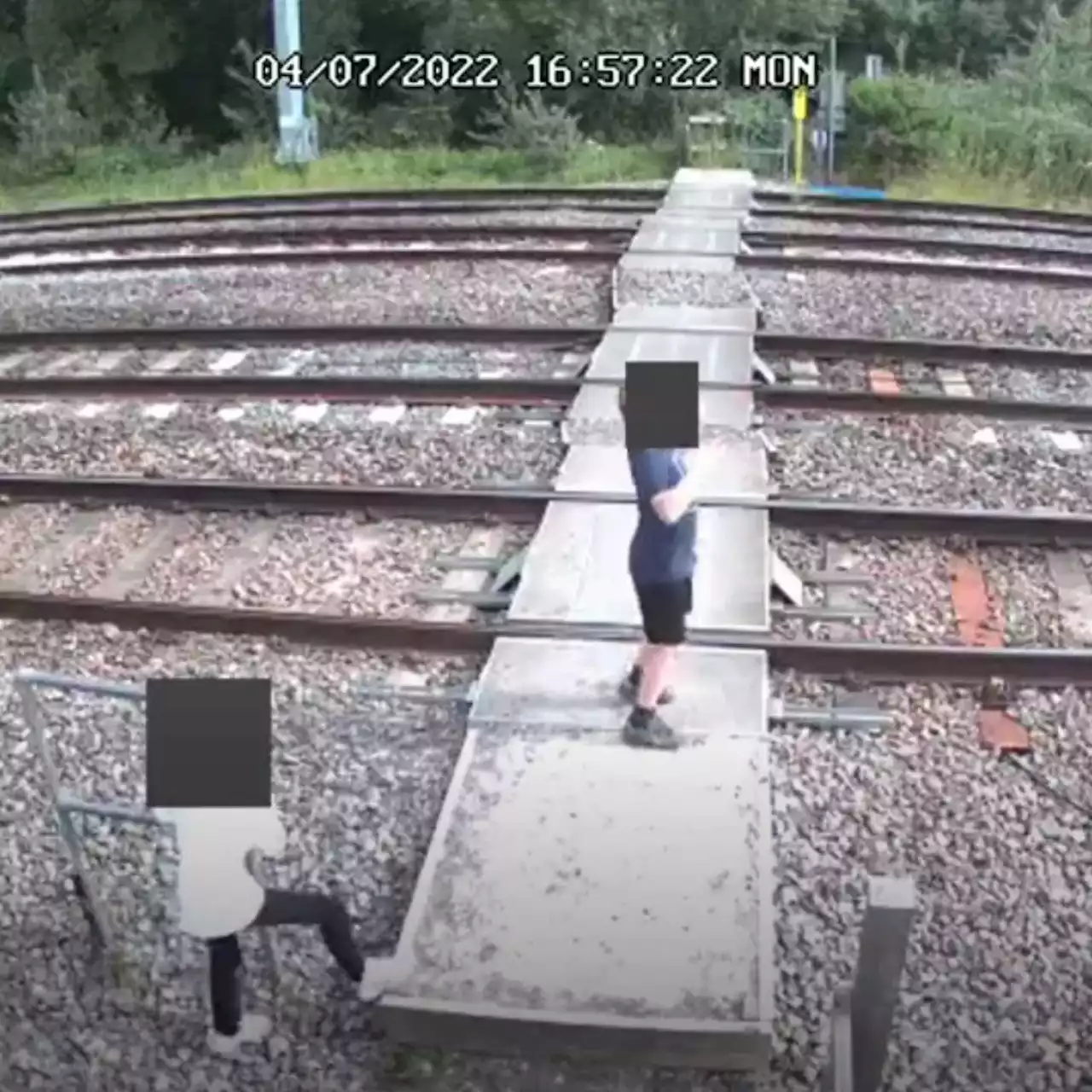 Warning to parents after kids dance on rail tracks as train roars past