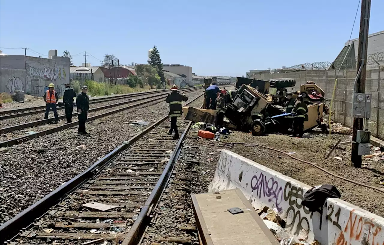 Tractor operator badly hurt in collision with Amtrak train in Oakland