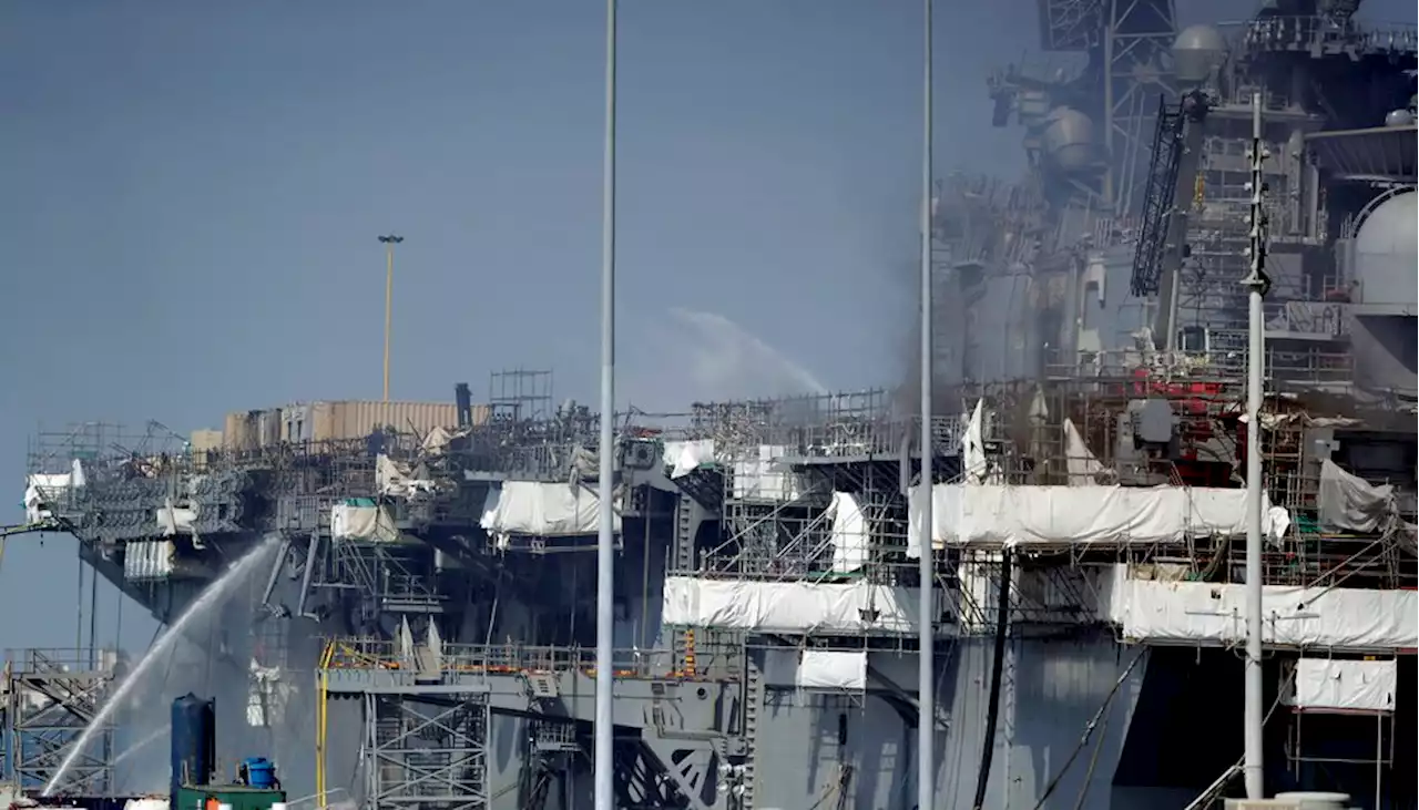 Navy disciplines officers in massive ship fire