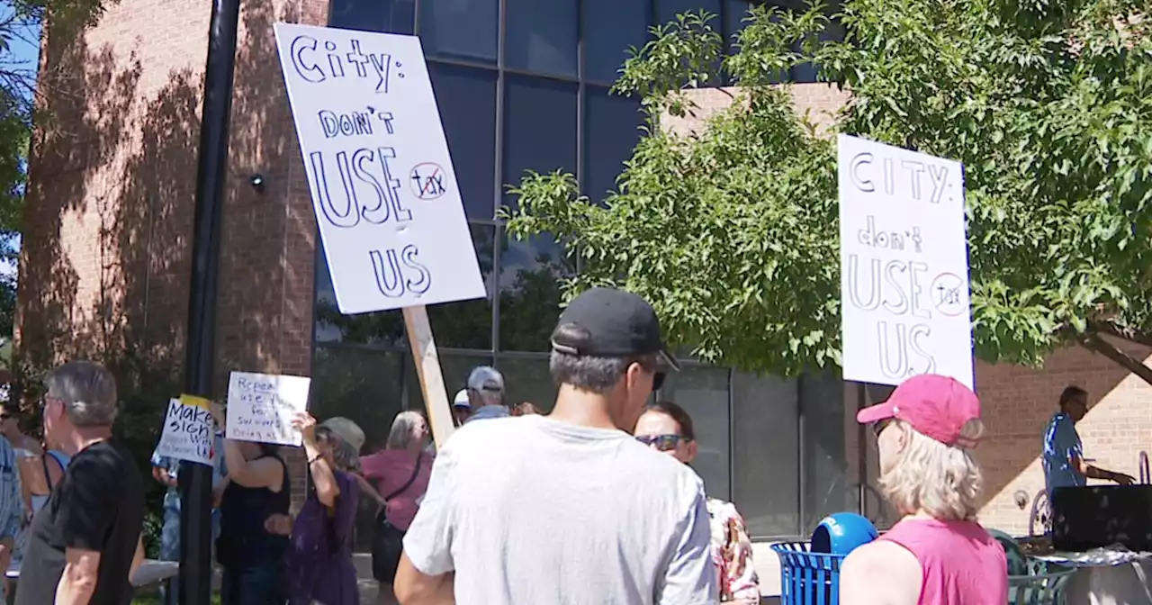 Marshall Fire victims protest in Louisville over use tax on rebuilding homes