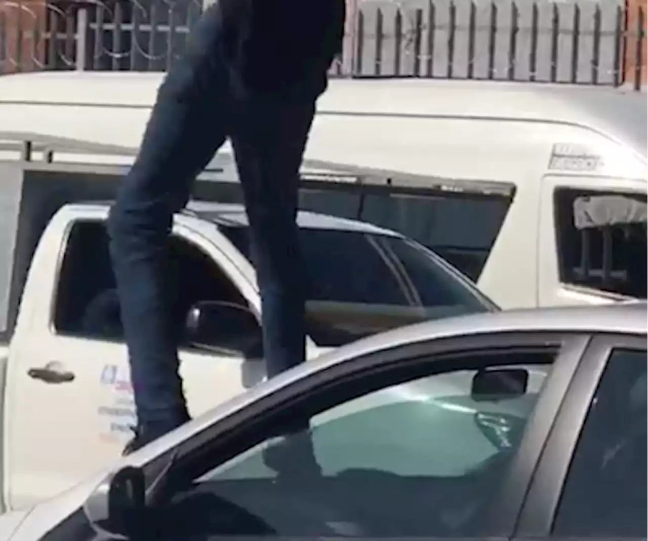 WATCH: Man jumping on car, smashing windscreen in Durban!