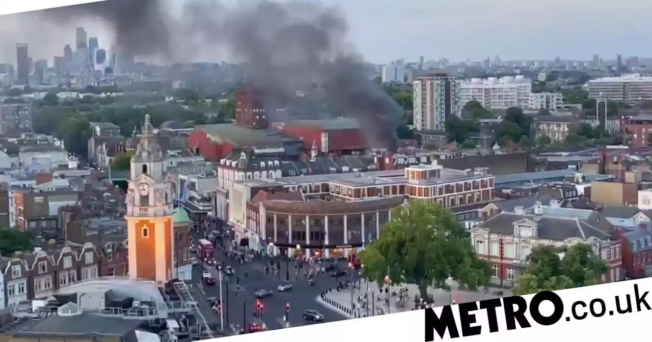 Huge fire breaks out at Brixton Market with 100 firefighters at scene