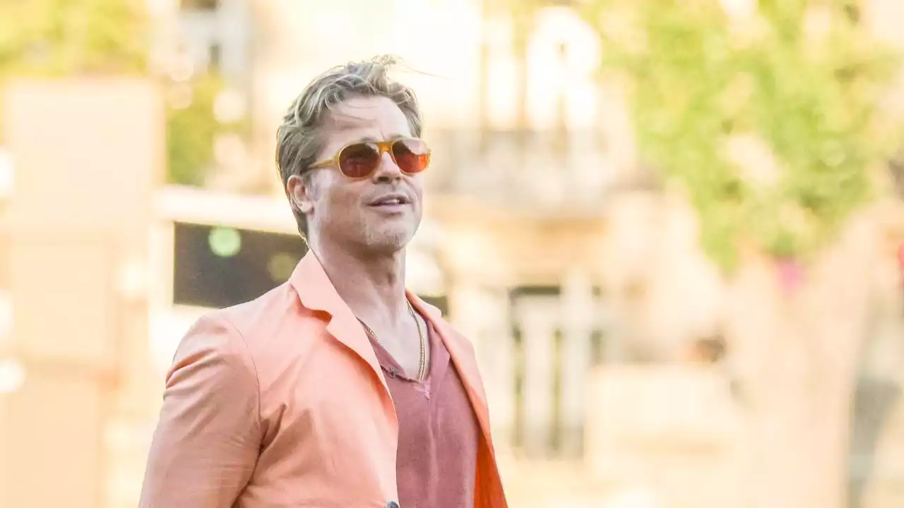 Brad Pitt Rocks an All-Orange Ensemble For 'Bullet Train' Photo Call