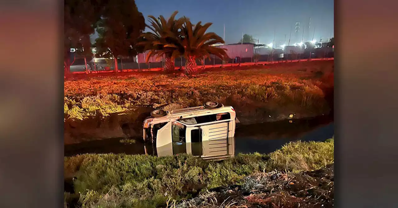 Firefighters rescue man who drove into canal by Oakland Coliseum