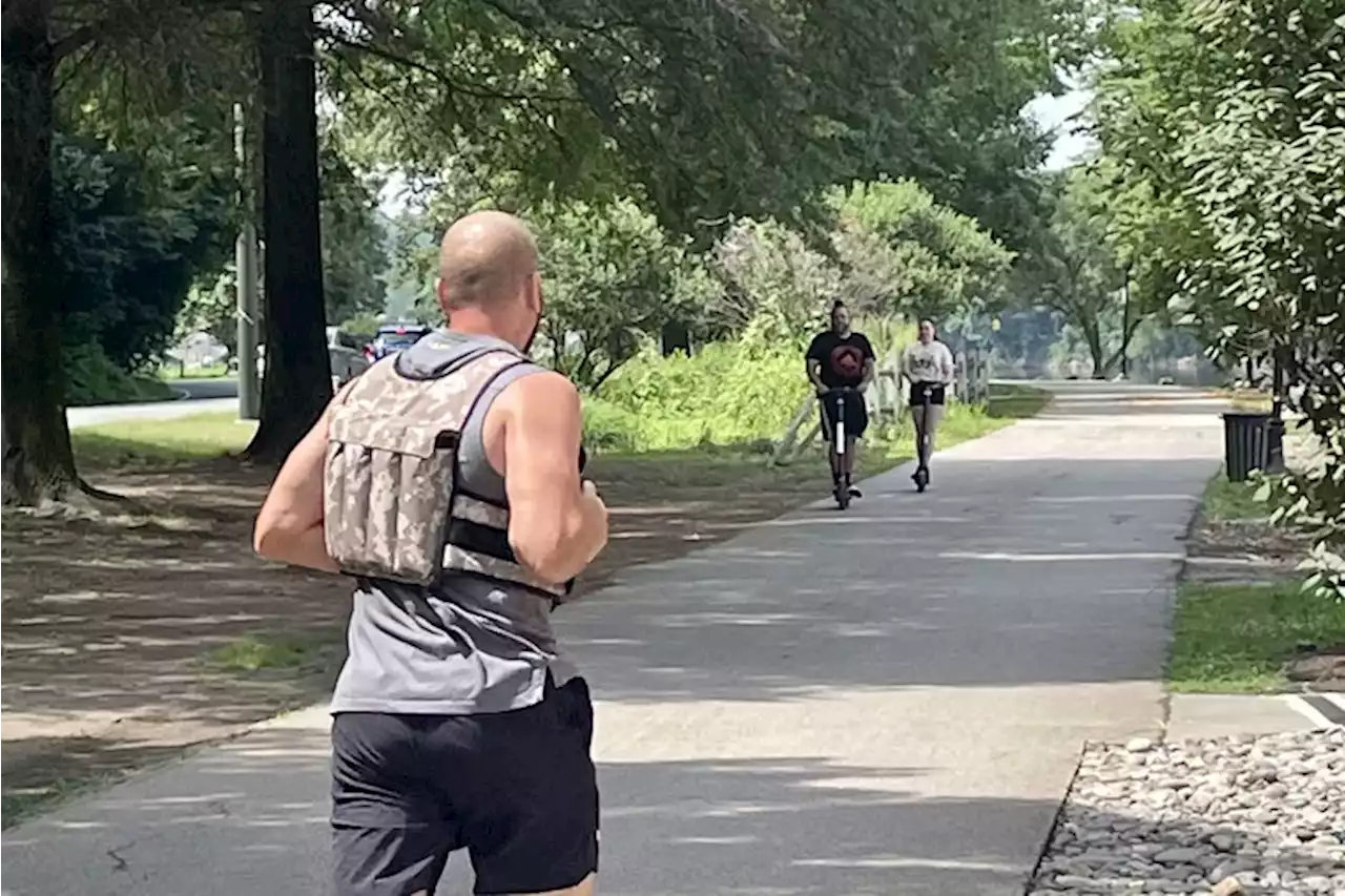 On the morning after a fatal shooting, runners, walkers and those on wheels returned to their workout routines along Kelly Drive undaunted but concerned