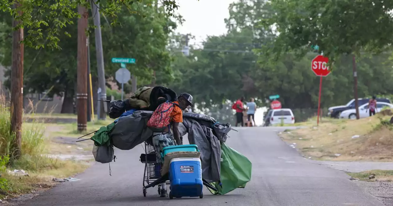 Dallas sweeps out a homeless camp