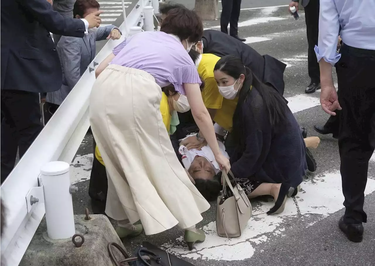 With Japan's ex-PM Shinzo Abe pale and lifeless, a doctor at the scene prayed for a miracle