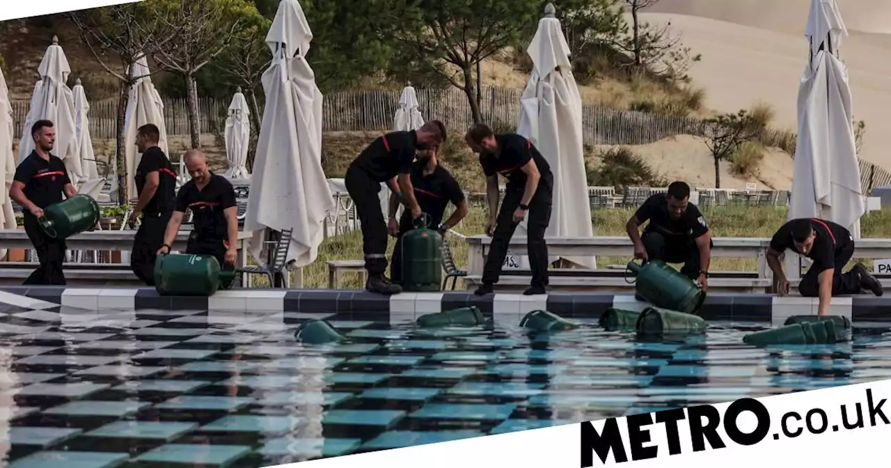 Gas cylinders thrown into swimming pool to stop them exploding in the heat