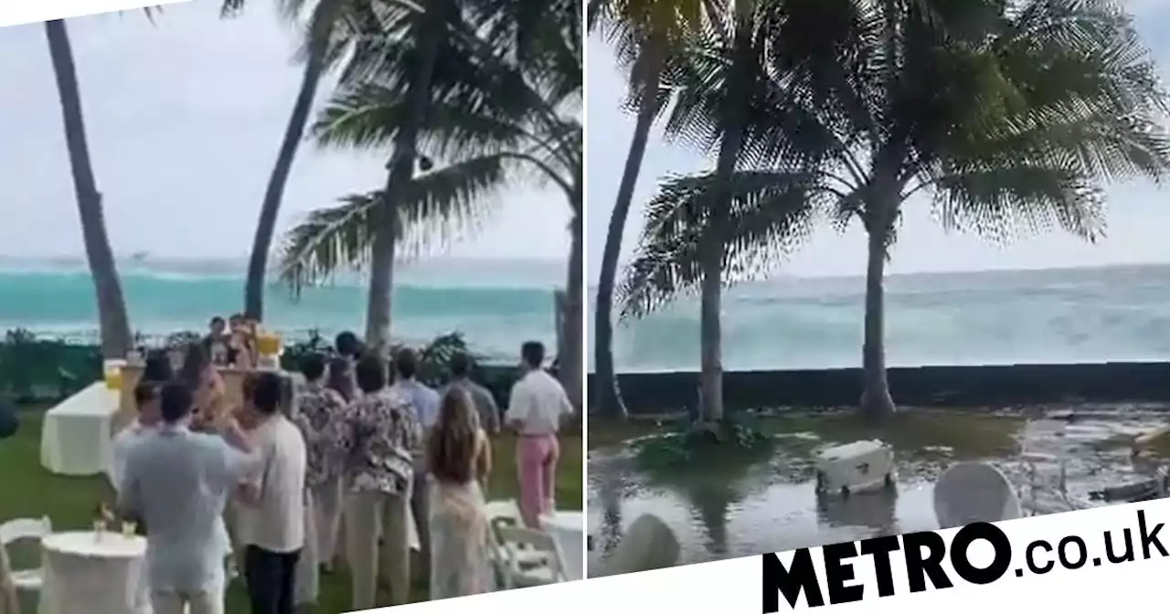 Wave crashes through wedding, sweeps away reception and guests run for cover