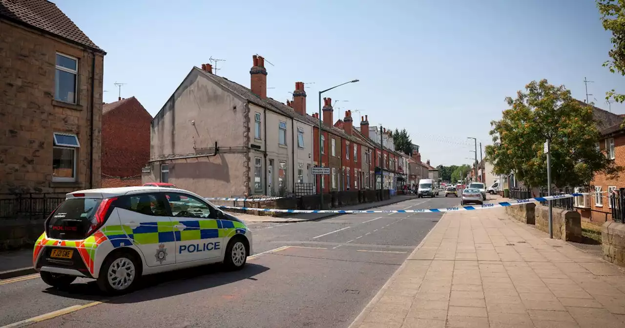 Major road closed after man attacked and taken to hospital