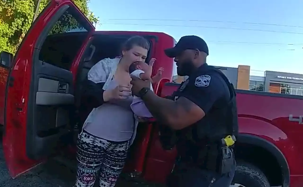 VIDEO: Police officers rush to save unconscious newborn baby at gas station