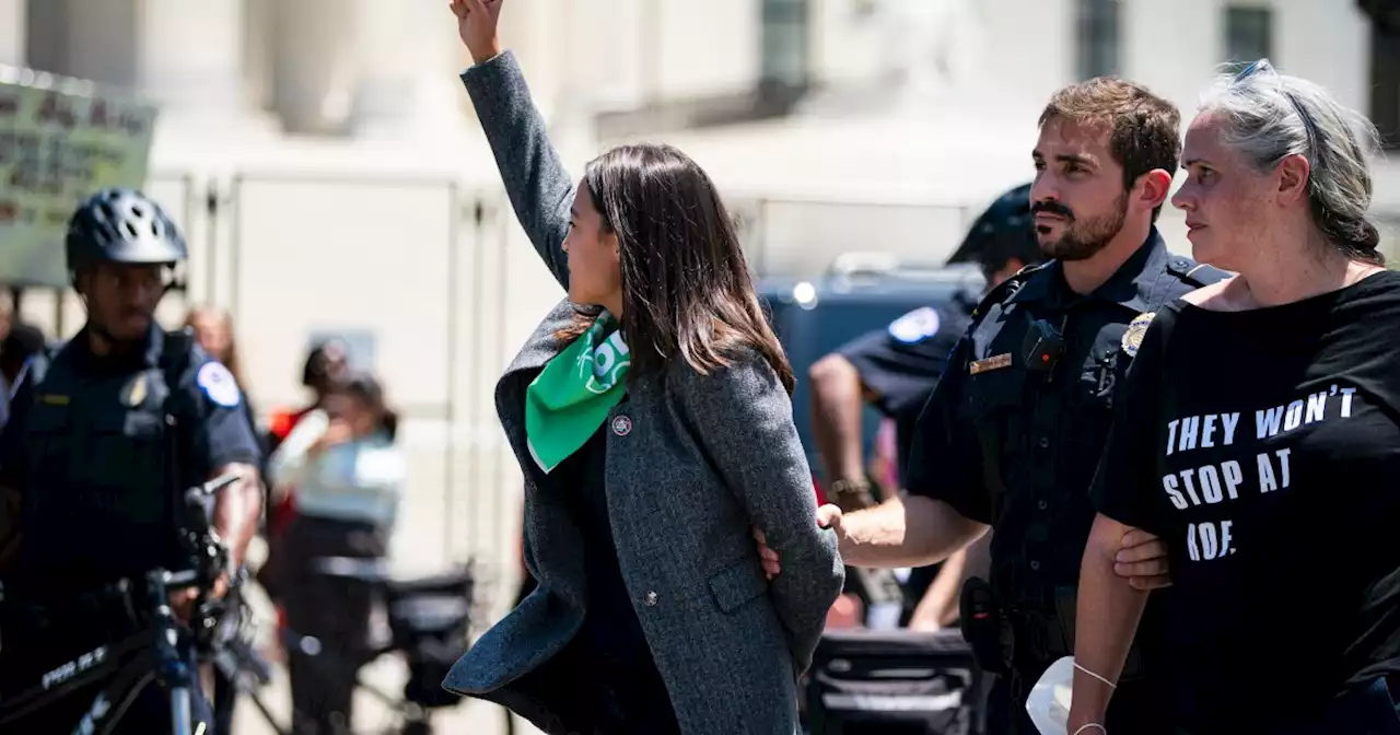 AOC insists she wasn't faking being handcuffed