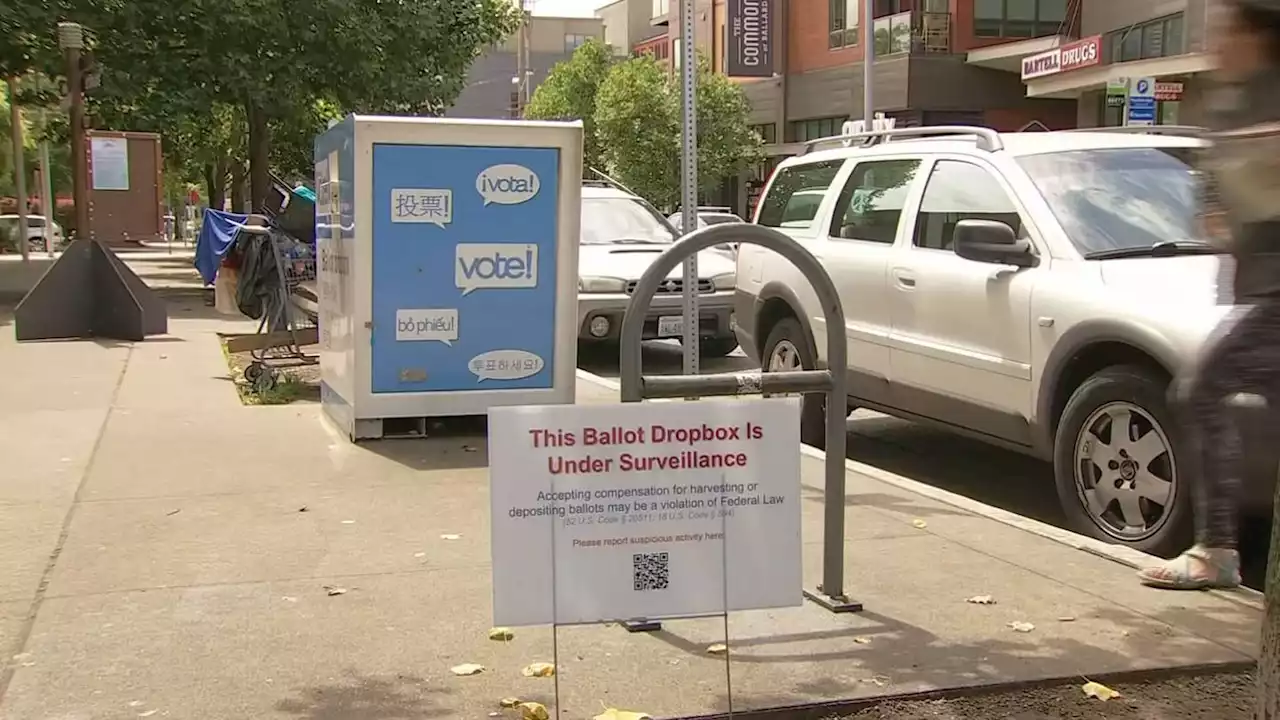 Officials call ‘under surveillance’ signs placed near ballot drop boxes voter intimidation