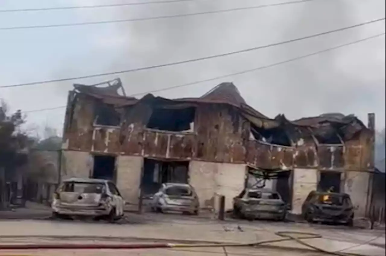 Homes gutted by fire on ‘warzone’ street as locals sob after ‘losing everything’