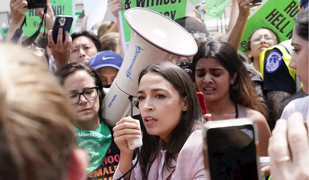 AOC, Omar fake being handcuffed in protest outside Supreme Court