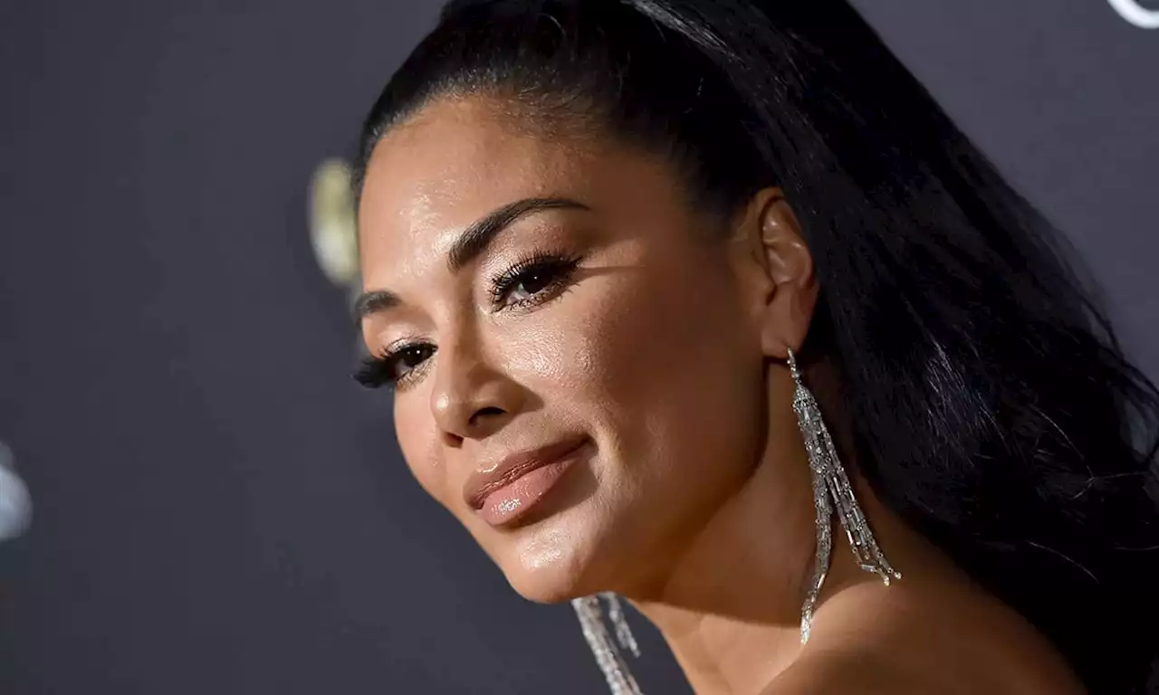 Nicole Scherzinger looks like an actual goddess in flowing white gown – and wow