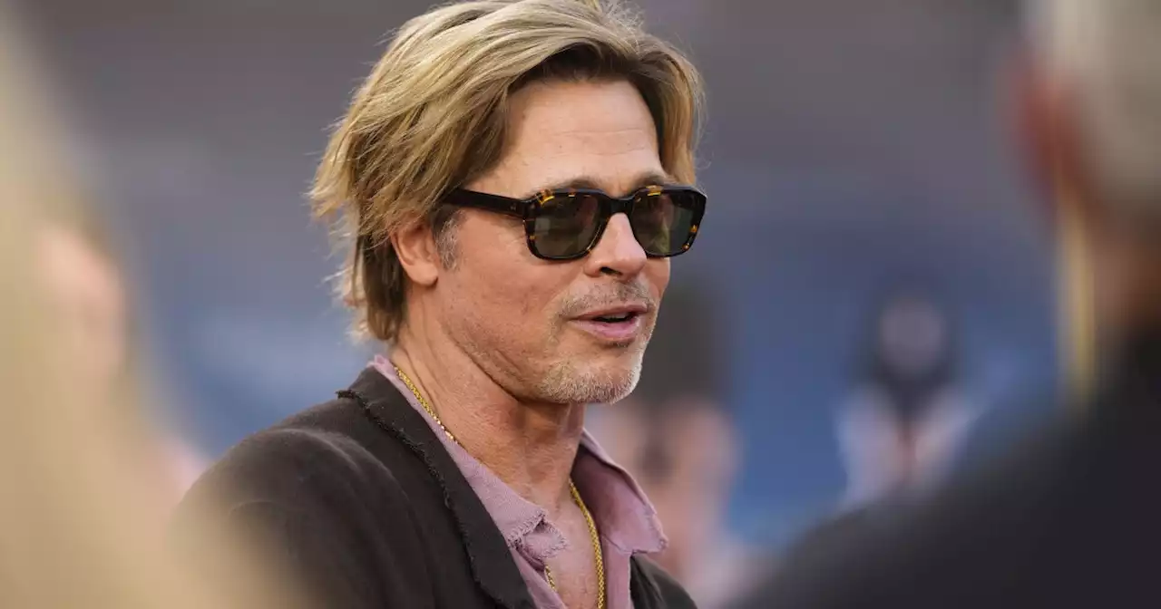 Brad Pitt is living his best, pants-free life on the 'Bullet Train' press tour