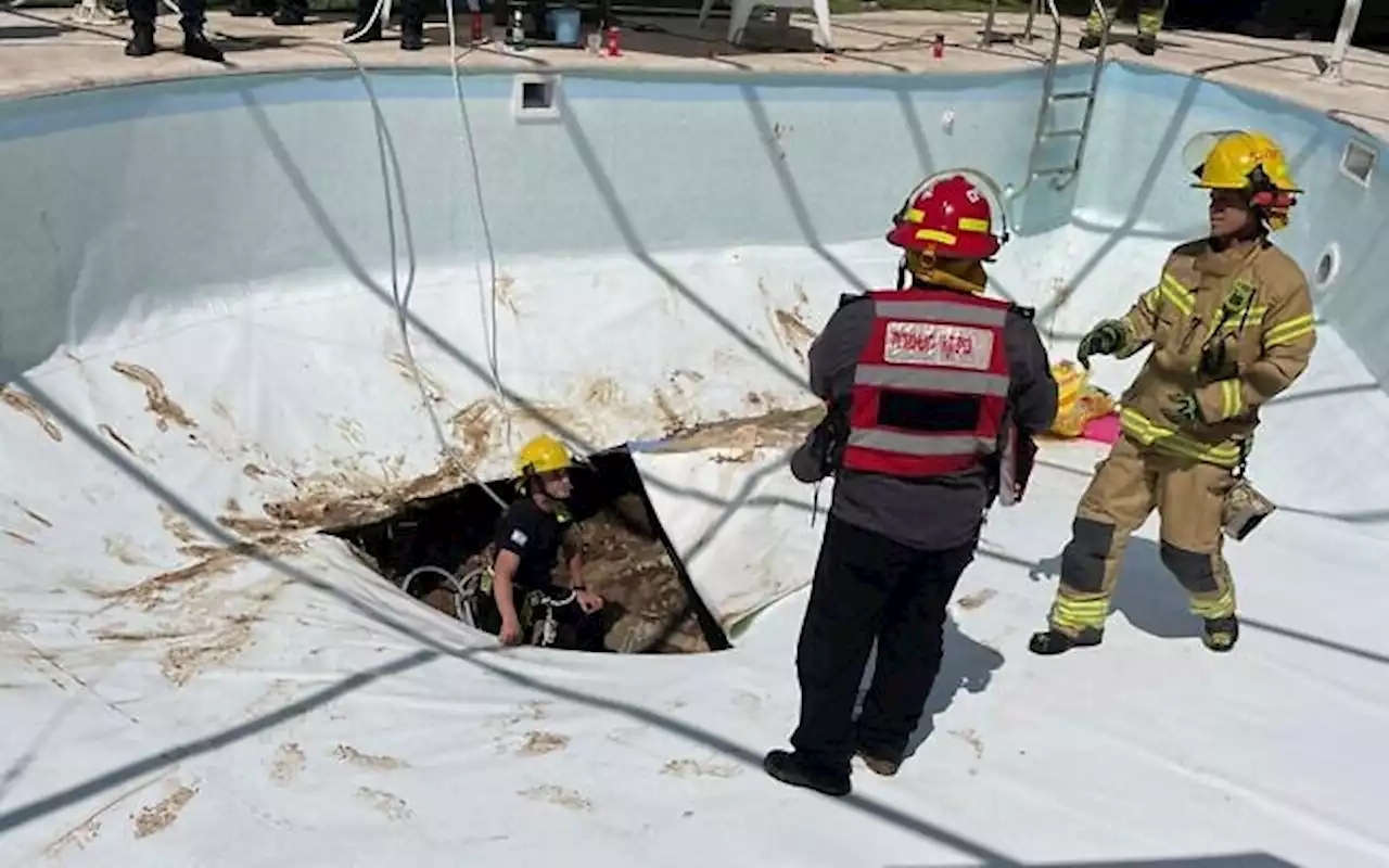 Man, 30, found dead after being swallowed by SINKHOLE inside swimming pool