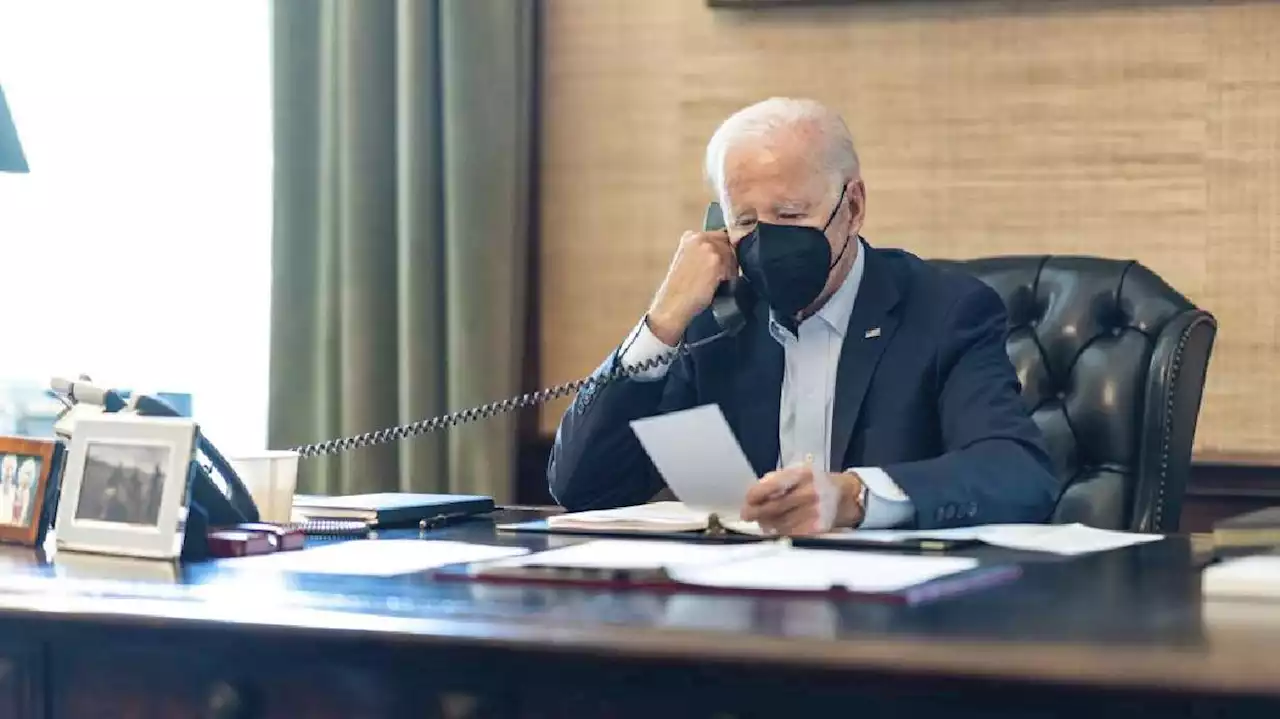 Vigorous but coughing, COVID-postive Biden appears virtually at White House meeting