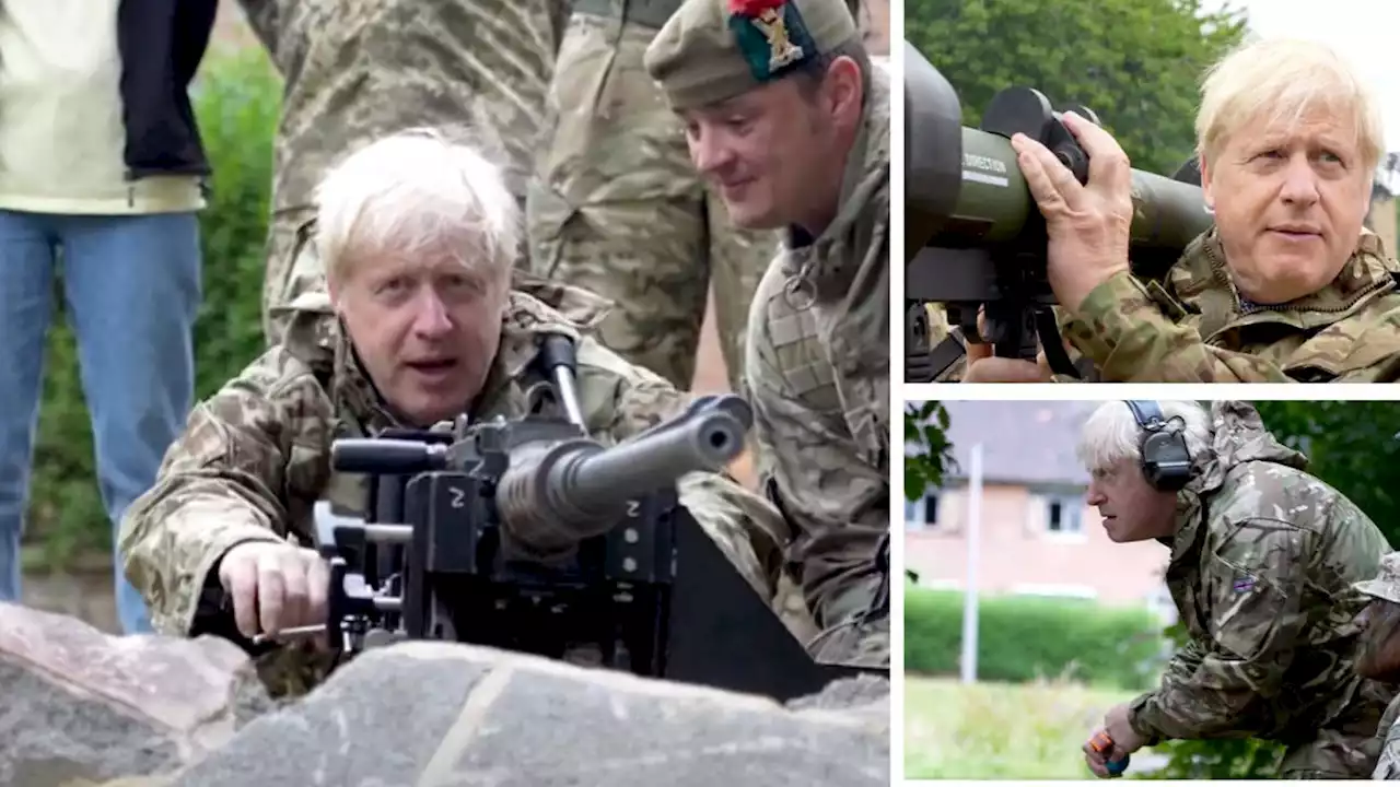 Boris gets to grips with machine guns as he preps troops to take on Putin's forces