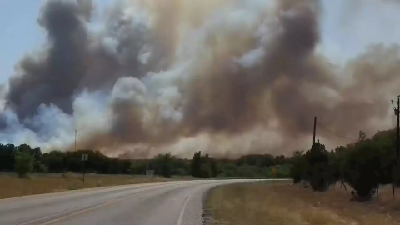 North Texas Wildfires Slow Advance