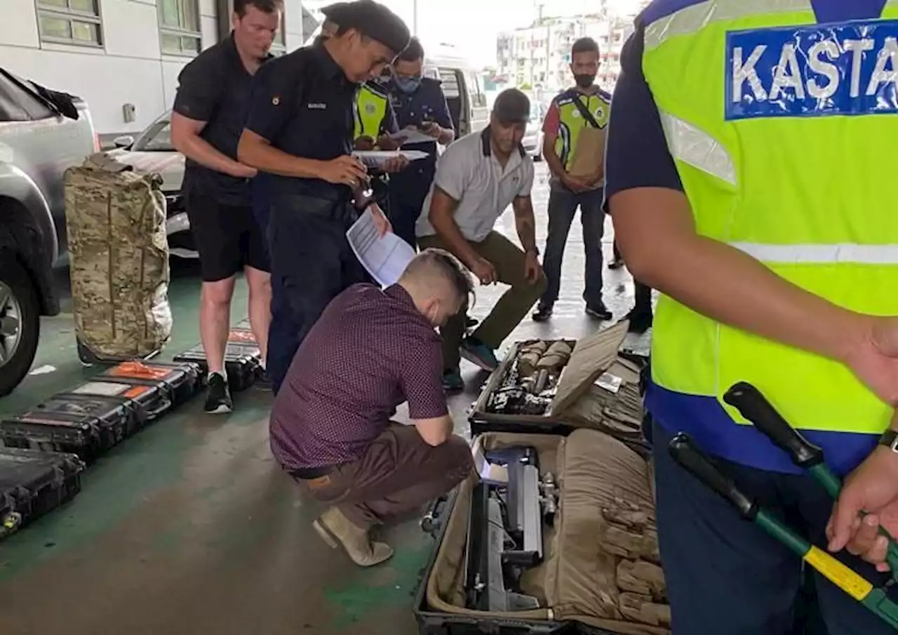 Cops: Photos of firearms in Johor show a routine check