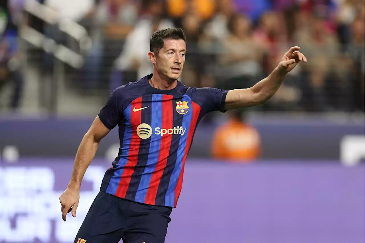 Robert Lewandowski debuts as Barcelona sink Real Madrid