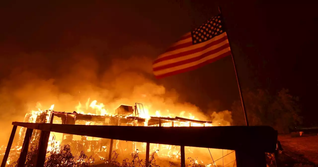 Explosive fire near Yosemite is California's largest this year, forcing thousands to flee