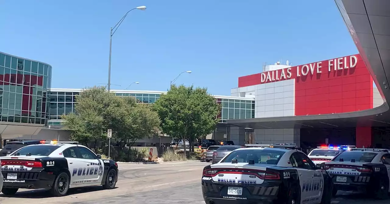 Dallas police shoot armed woman after several shots fired inside Love Field airport