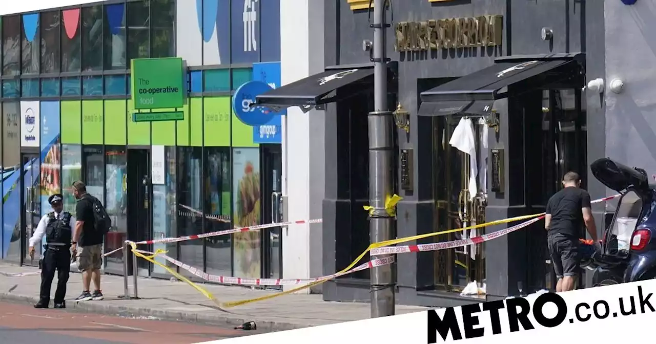 Murder suspect held after man knifed to death in London pub