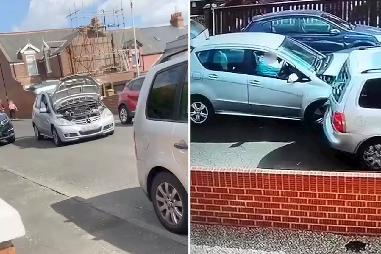 Watch moment 'idiot' drives with open bonnet & smashes into parked car