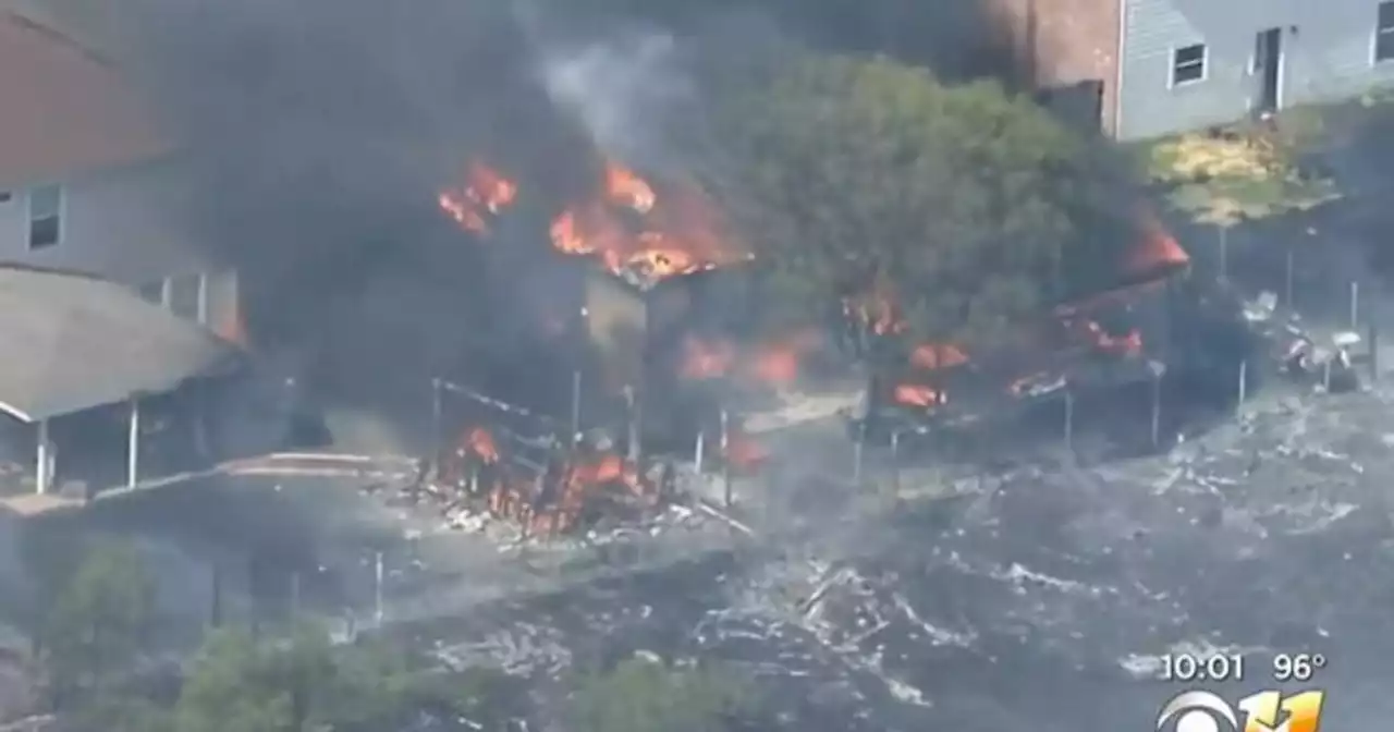 Grass fire likely sparked by mower chars as many as 20 Dallas area homes