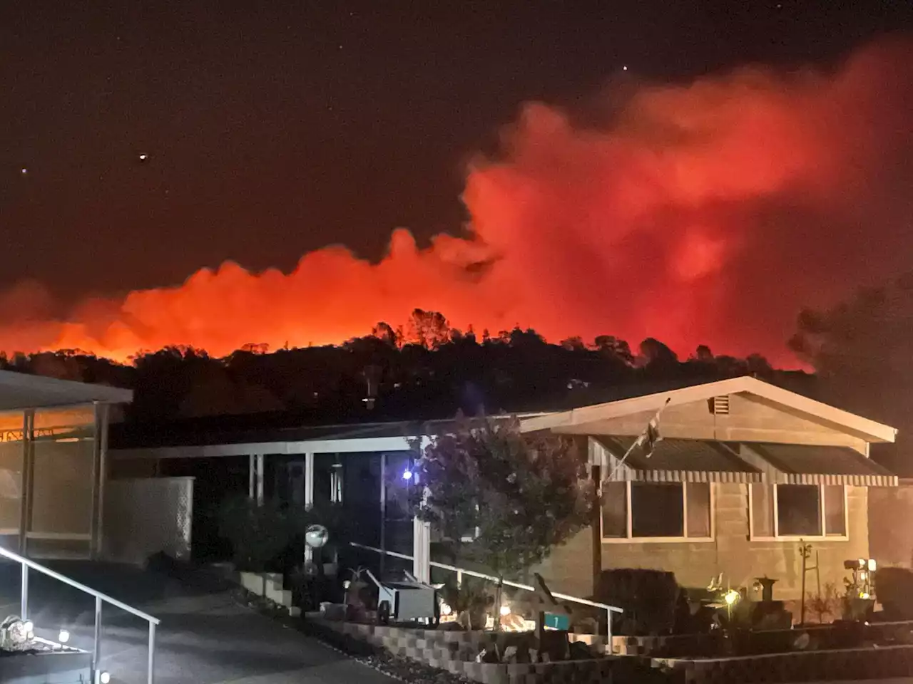 Light rain falls over Oak Fire as firefighters battle blaze