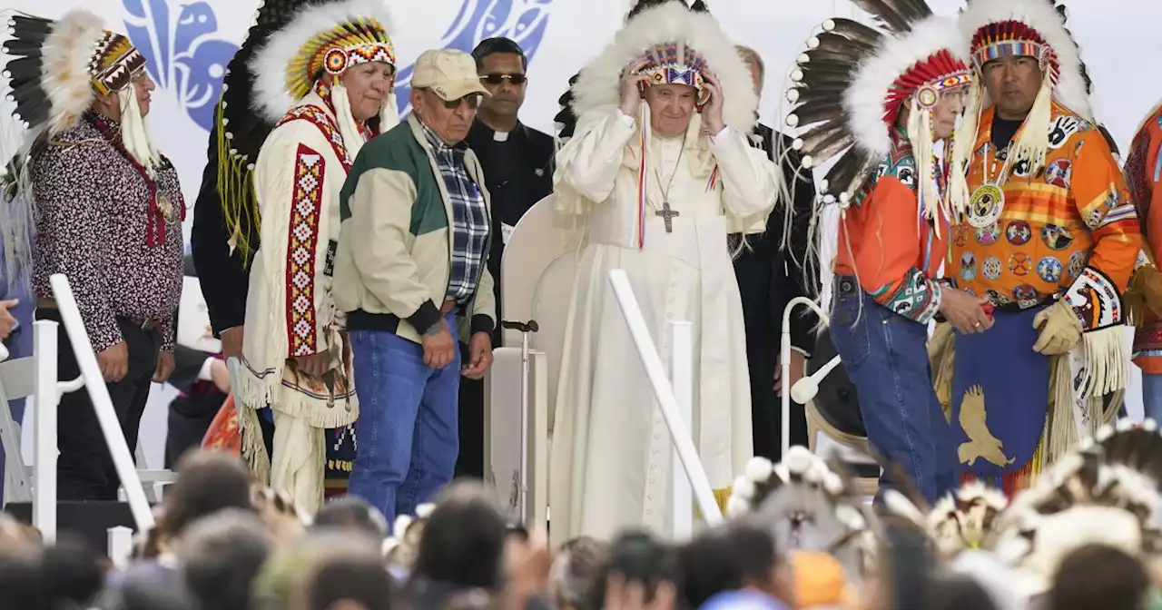 Pope Francis in Indigenous headdress in Canada draws mixed response