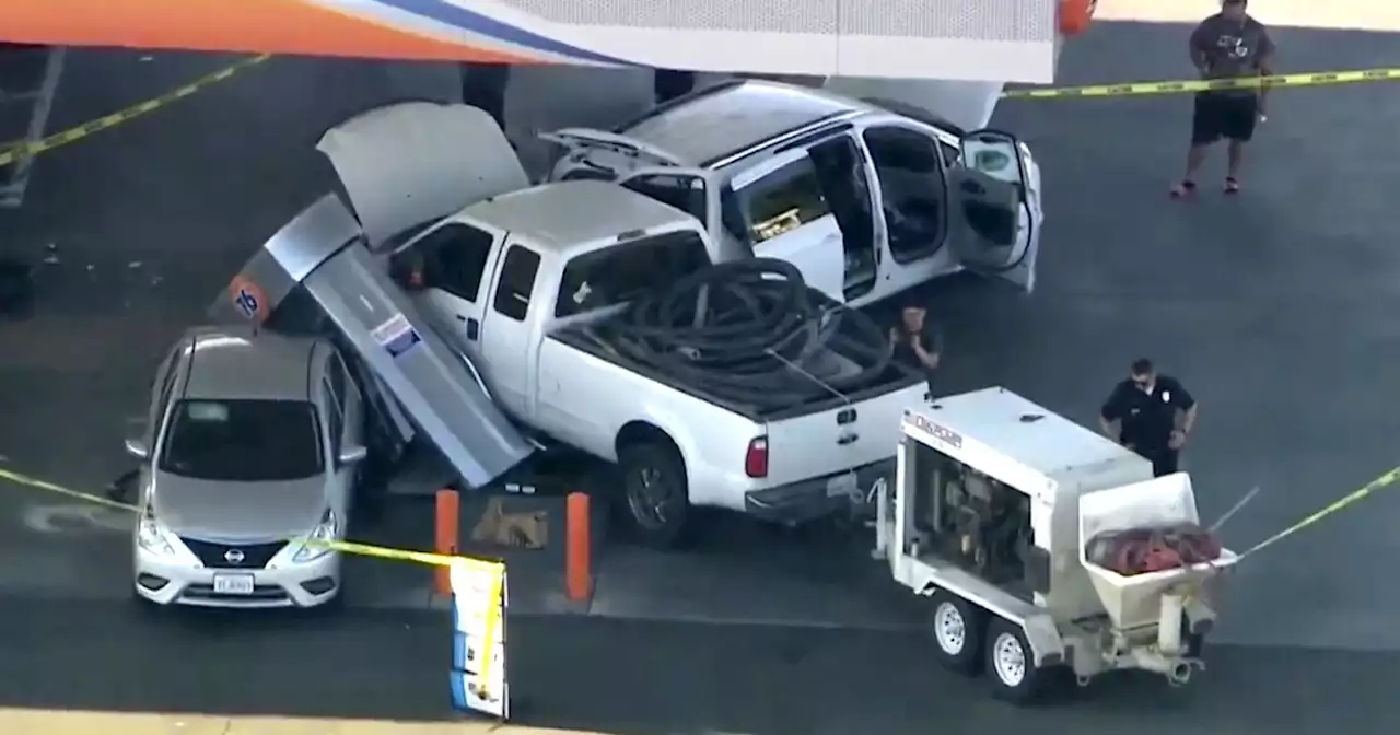 11 injured when truck crashes into Panorama City gas station, knocks over pump