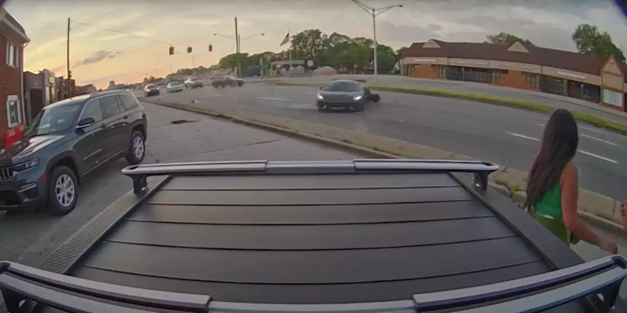 Watch a Honda SUV Smash Into a McLaren 570s on Woodward Ave