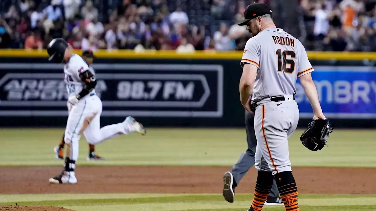 Giants pitcher apologizes for nailing teammate with bat