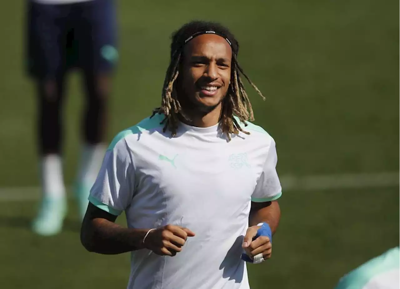 Soccer-Fulham sign defender Mbabu from Wolfsburg