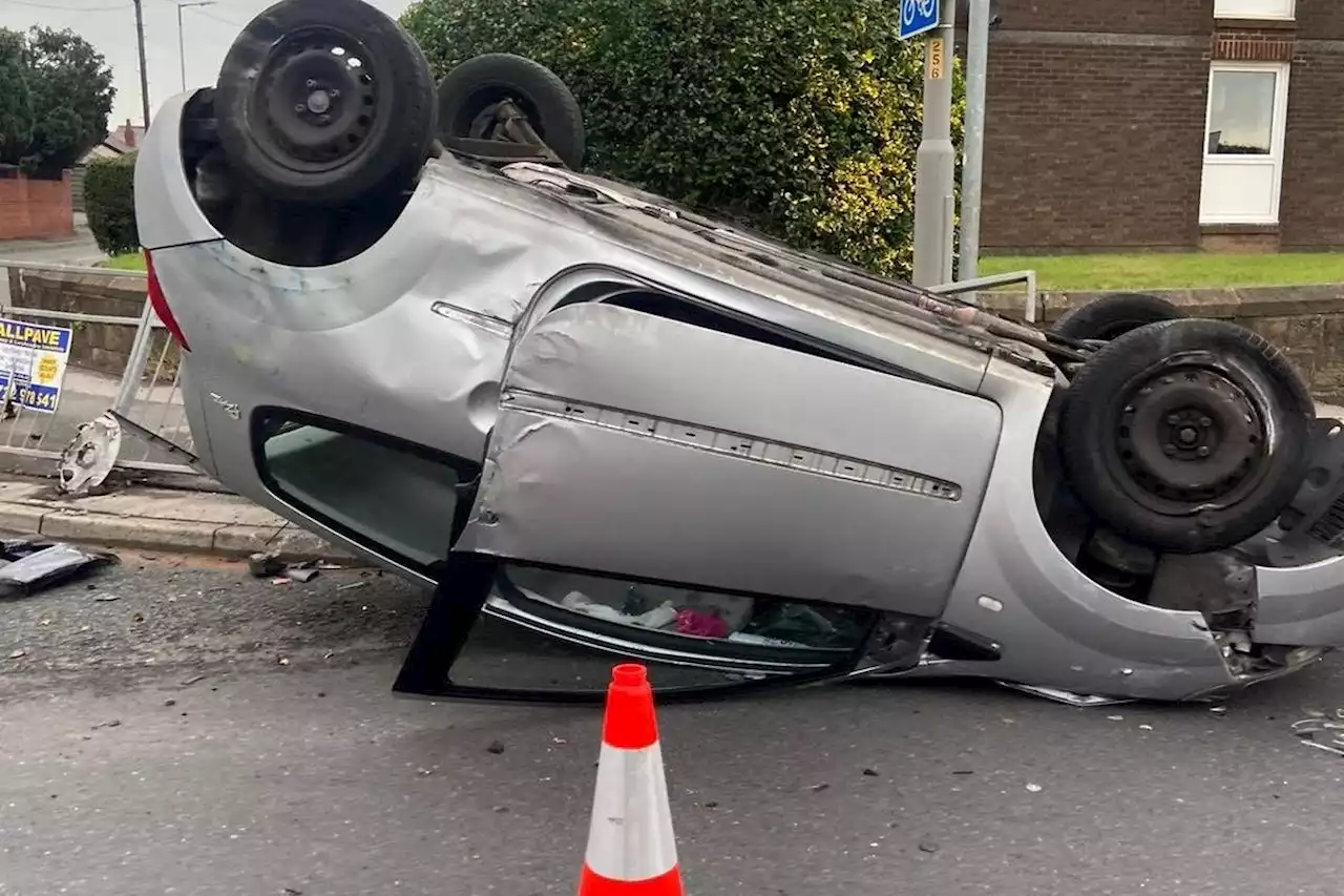 These were the scenes after a car crashed and overturned in Preston today