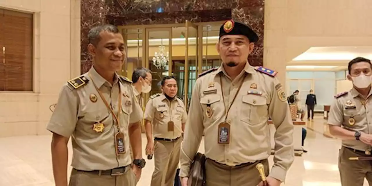 Seragam Baru PNS Kementerian ATR/BPN, DPR: Apa Filosofi Penyematan Baret-Tongkat? | merdeka.com