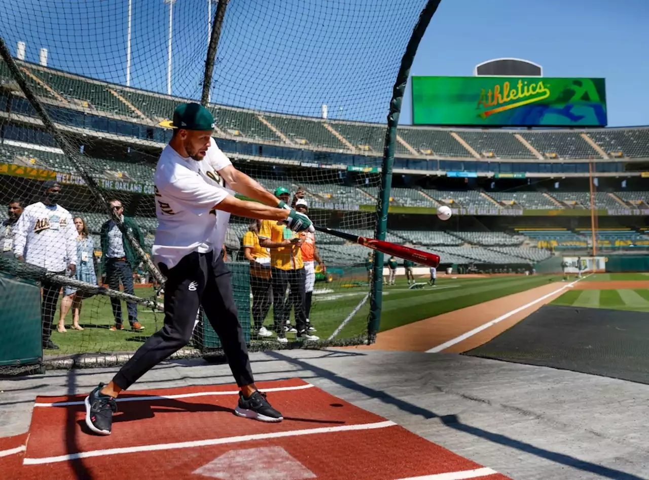 Steph Curry takes Coliseum batting practice before A’s game